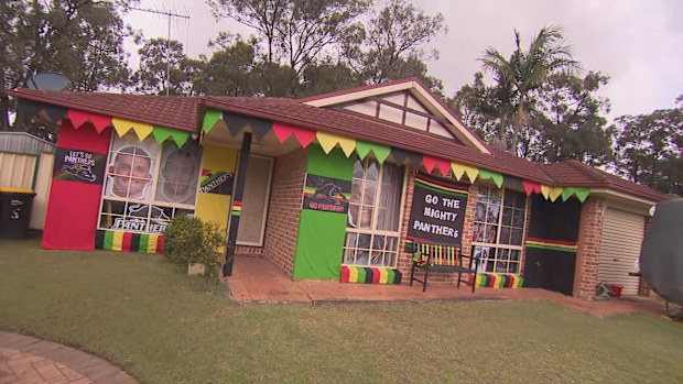 Super fan Annette has decked out her home in black, red, yellow and green.