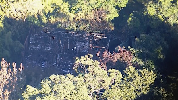 The house was all but destroyed in the fire.