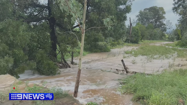 A brief but brutal downpour last night sparked a third flooding emergency in Quensland's South Burnett region.