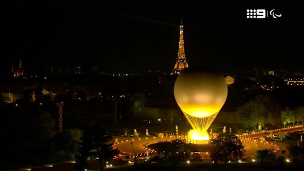 Paralympic flame is lit.