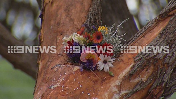 Floral tributes have been left at the scene of a horror crash which left two men dead on South Australia Kangaroo Island last night.