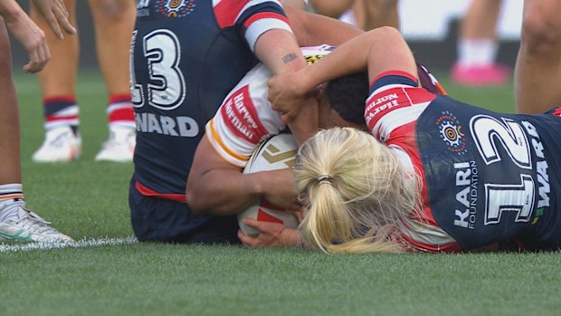 Mele Hafunga scores for the Broncos.