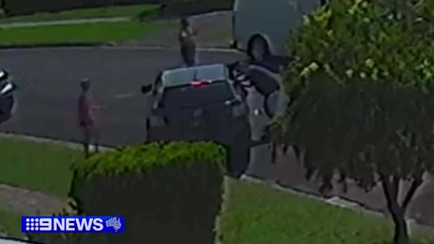 A search is under way for a father who pulled his children from a vehicle and fled a collision at Menai in Sydney's south.Witnesses raced to the rescue of a woman stuck in one car before emergency services took over.