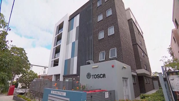 A man is in hospital after he was allegedly attacked with a samurai sword at a Lidcombe unit block.