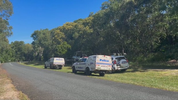 Police at the scene of a fatal shark attack near Hull Heads Beach, Queensland.