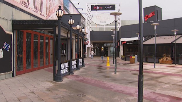 A machete and extendable batons were allegedly brandished during the robbery of a teen that sparked a lockdown and evacuation at Adelaide's biggest suburban shopping mall. Westfield Marion
