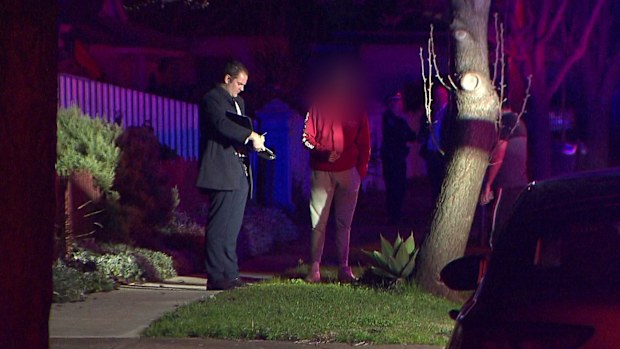 Police allege the fight between the group of men involved an axe and a knife.