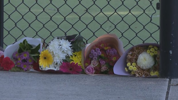 Flowers have been left at the nets by mourners in the intervening days.
