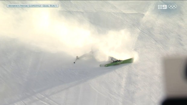 Eileen Gu crashes on the first rail during women's slopestyle qualification.
