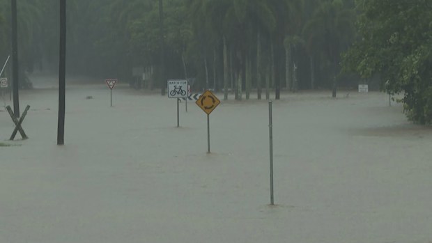 A flood emergency is unfolding in Cairns, with residents evacuated and homes going under water.