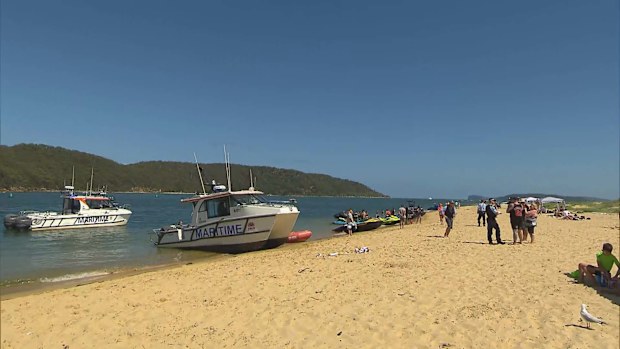 Tributes are being paid to a "proud" 39-year-old dad who died after going for a swim with his son north of Sydney.