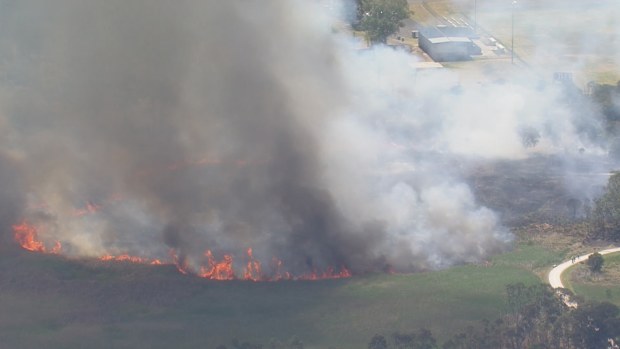 Crews are battling a grass fire in Penrith in Sydney's west.