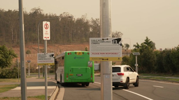Parents at one Queensland school say they're being forced to make an impossible choice right now - break the parking rules and cop a fine or risk breaking the road rules and the safety of their children.