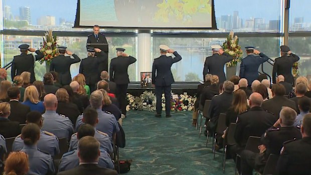 More than 1500 people remembered the constable as a "larger than life" personality.