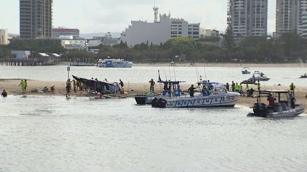 Police said two helicopters "came into contact", with one landing safely and the other crashing. 