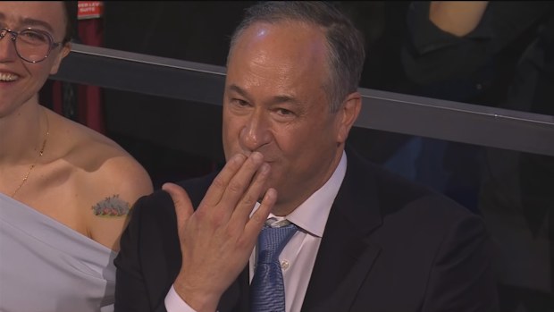 Doug Emhoff blows a kiss to Kamala Harris at the Democratic National Convention