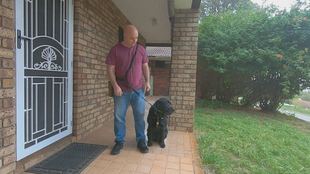 David Pearce and his English Labrador, Gunner, were denied entry to a Chinese restaurant Juicy Bao Bao on Friday.