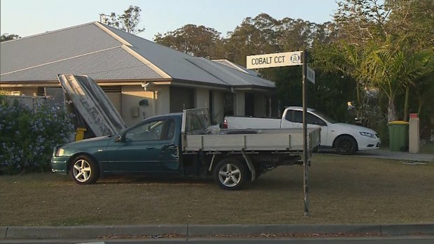 Police are searching for two gunmen who fired multiple shots at a Gold Coast home.