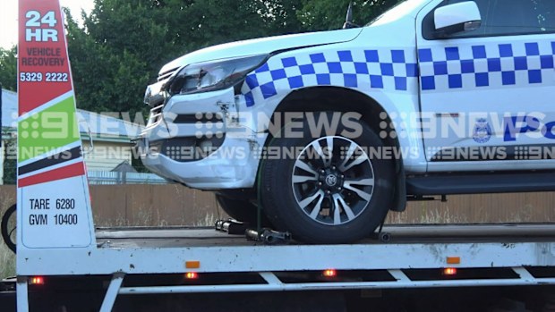 A police vehicle is towed away from a street in Delacombe , Ballarat