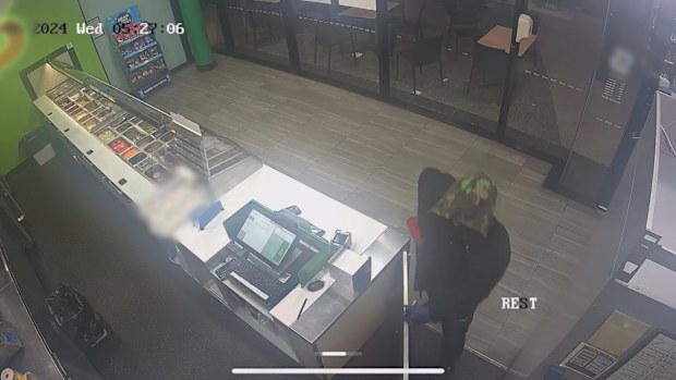 Police are searching for a man who robbed a fast food restaurant armed with a knife in Ipswich.