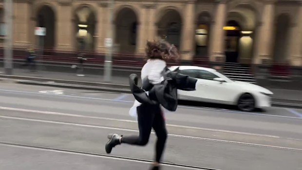 A man and a woman have been arrested for allegedly assaulting protective services officers at a court in Melbourne. 