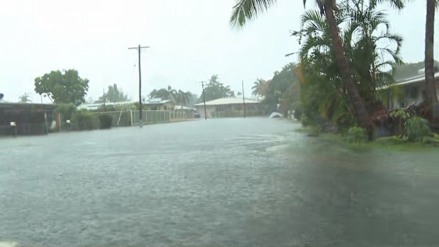 A flood emergency is unfolding in Cairns, with residents evacuated and homes going under water.