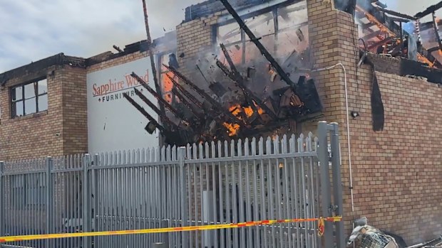 More than 50 firefighters are on scene battling the blaze.