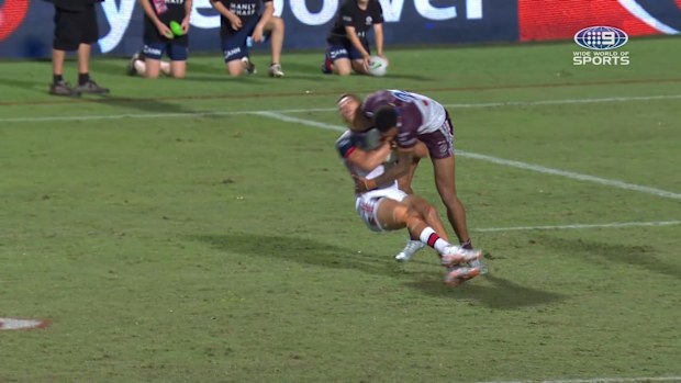 Manly winger Jason Saab hits Hugo Savala high.