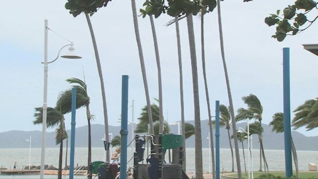 Tropical Cyclone Koji set to cross Queensland coast as Category 2 storm