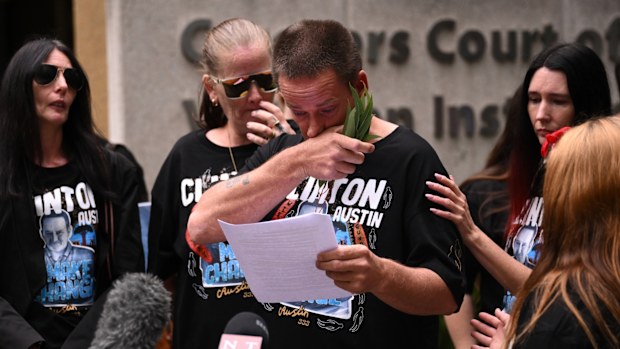 Shaun Austin (centre), twin brother of Clinton Austin reads a statement outside the inquest into death of Clinton Austin, at the Melbourne Coroners Court, in Melbourne, Monday, March 24, 2025. Clinton Austin, a 38-year-old Gunditjmara and Wiradjuri man died at Loddon Prison after being found unresponsive in his cell.  