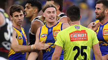 PERTH, AUSTRALIA - JUNE 01: Harley Reid of the Eagles chats with an umpire after giving away a free kick during the round 12 AFL match between West Coast Eagles and St Kilda Saints at Optus Stadium, on June 01, 2024, in Perth, Australia. (Photo by Paul Kane/Getty Images)