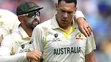 Nathan Lyon embraces teammate Scott Boland during the WTC final.