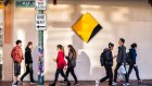 CBA may need to spend an extra $200 million a year on "defensive actions" in response to the Austrac allegations, analysts predict.