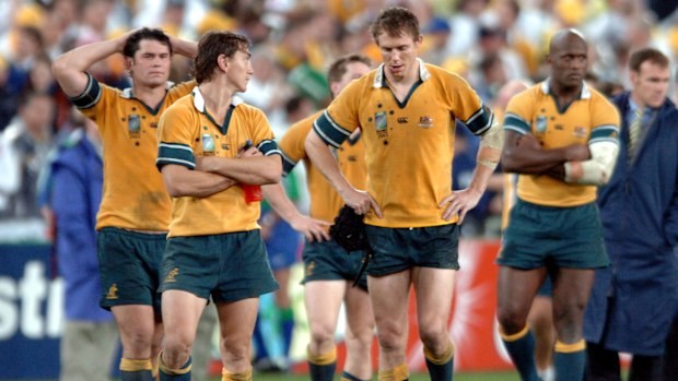Jeremy Paul, Mat Rogers, Stephen Larkham and Wendell Sailor after the 2003 Rugby World Cup final.
