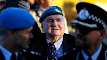 Ian Hardy, centre, was among the first Australian police officers on the island 53 years ago.
