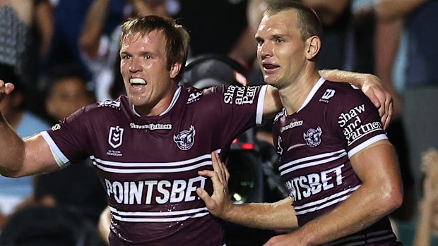 SYDNEY, AUSTRALIA - MARCH 16: Tom Trbojevic (R) of the Sea Eagles celebrates with Jake Trbojevic of the Sea Eagles after scoring a try during the round three NRL match between Manly Sea Eagles and Parramatta Eels at 4 Pines Park on March 16, 2023 in Sydney, Australia. (Photo by Cameron Spencer/Getty Images)