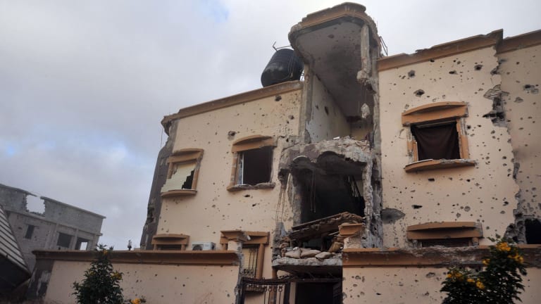 This building was damaged in clashes between Libyan armed forces and Islamic State group militants west of Benghazi, Libya.