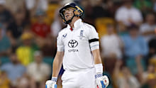 BRISBANE, AUSTRALIA - DECEMBER 06: Ollie Pope of England reacts after being dismissedduring day three of the Second 2025/26 Ashes Series Test Match between Australia and England at The Gabba on December 06, 2025 in Brisbane, Australia. (Photo by Darrian Traynor/Getty Images)