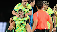 Kyra Cooney-Cross of the Matildas celebrates kicking a goal.