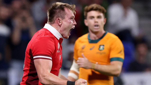 Nick Tompkins of Wales celebrates scoring his team's second try during the Rugby World Cup in Lyon.