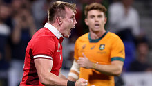 Nick Tompkins of Wales celebrates scoring his team's second try during the Rugby World Cup in Lyon.