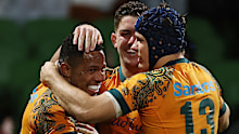 Filipo Daugunu of the Wallabies celebrates with after scoring a try.