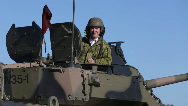 Defence Industry Minister Christopher Pyne, in the turret of Patria AMV35 at Puckapunyal Range, Victoria.