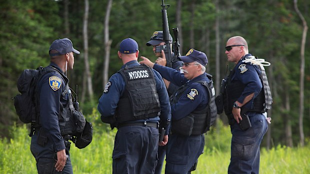 Police have surrounded escaped prisoner David Sweat who has been on the run for three weeks. (AAP) 