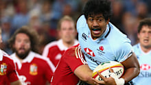 Will Skelton of the Waratahs is tackled against the British and Irish Lions at Allianz Stadium in 2013.