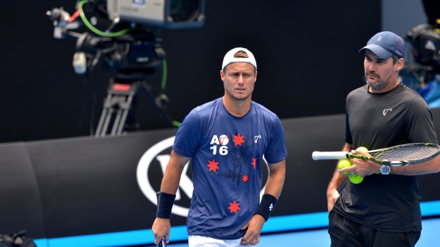 Preparing for his swansong: Lleyton Hewitt with  Roger Federer at a practice session for the Australian Open.