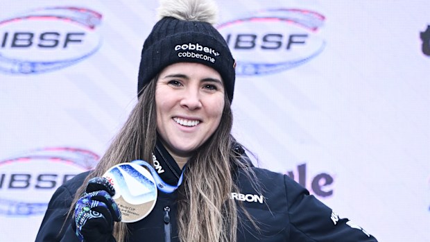 Bree Walker poses with her her second straight World Cup monobob gold medal.