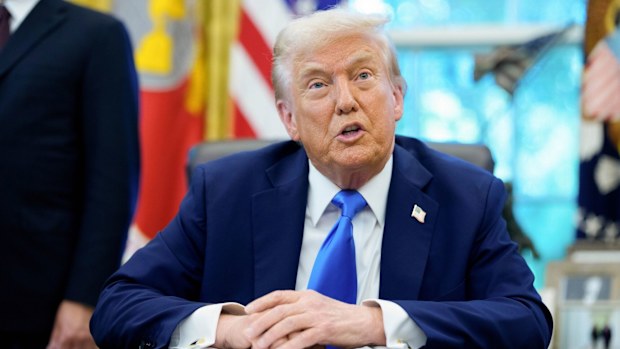 US President Donald Trump speaks to members of the media in the Oval Office of the White House in Washington, DC, US, on Friday, Sept. 19, 2025. Trump is signing a proclamation that would move to extensively overhaul the H-1B visa program, requiring a $100,000 fee for applications in a bid to curb overuse, according to a White House official familiar with the matter. Photographer: Aaron Schwartz/CNP/Bloomberg