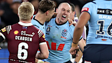Dylan Edwards of the Blues celebrates with team mates after scoring a try in his debut Origin match.