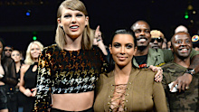 Taylor Swift and Kim Kardashian West onstage during the 2015 MTV Video Music Awards at Microsoft Theater on August 30, 2015 in Los Angeles, California.